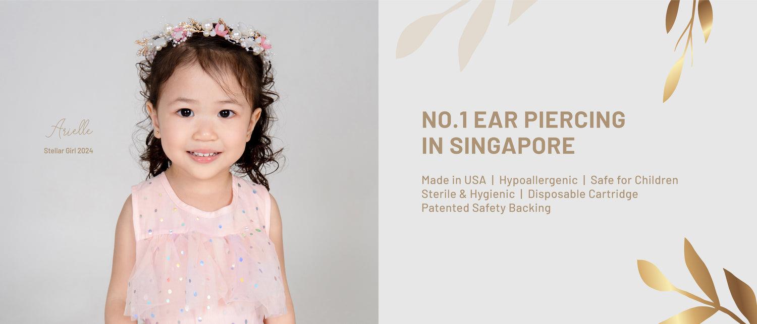 Young girl smiling and showcasing No.1 ear piercing services in Singapore, hypoallergenic and safe for children, available at Stellar Malaysia